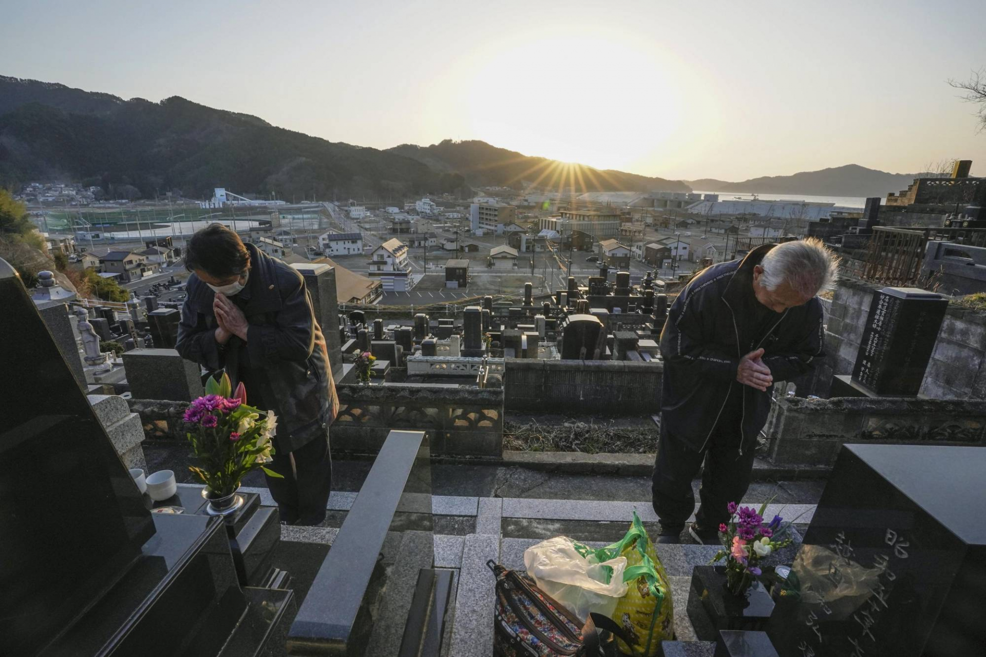 Japan mourns lives lost in earthquake and Fukushima disaster 10 years ago 4829-np-file-74971